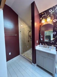 after of bathroom remodel with porcelain panel slab shower