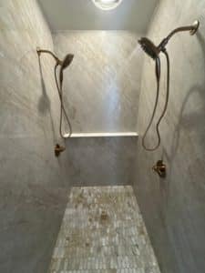 dual shower head porcelain slab panel shower with accent floor